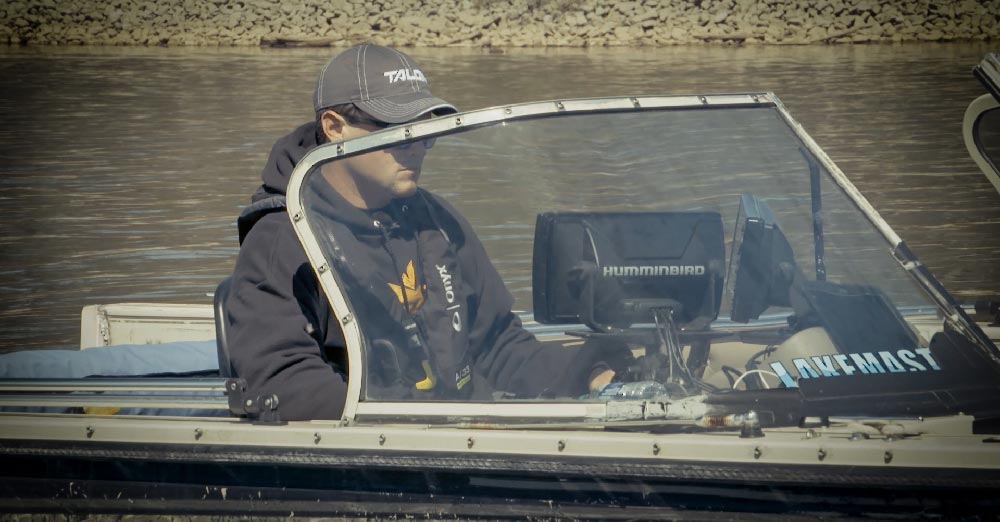 justin atkins surveying in lakemaster boat