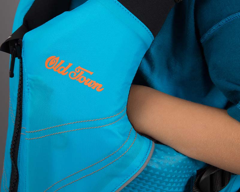 Fleece-lined hand warmers on the kids's inlet jr life jacket