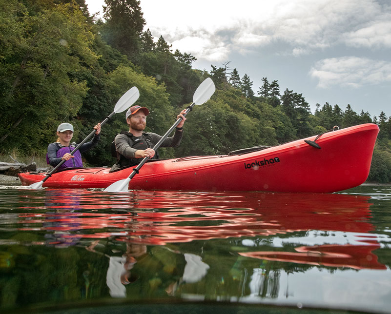 Couple paddling in the Old Town Looksha T touring kayak