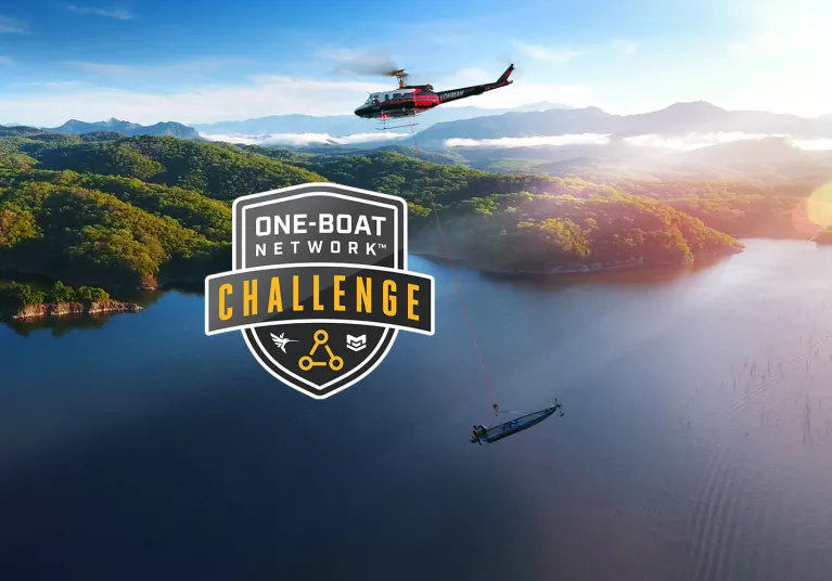 One Boat Network challenge helicopter carrying a boat to Lake El Salto
